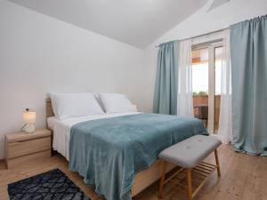 A bed or beds in a room at Villa Villa Flori by Interhome