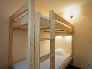 a couple of bunk beds in a room at Apartment Jonquilles-10 by Interhome in Chamonix