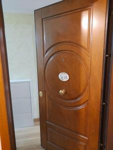 a wooden door with a sticker on it at Casa Sigiu - La Vetta in Terminillo
