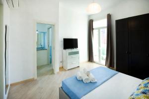 Posteľ alebo postele v izbe v ubytovaní Casa Miniero Sorrento Center