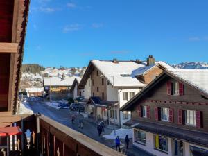 a view of a street in a town with buildings at Apartment Chalet Burgfeld by Interhome in Beatenberg