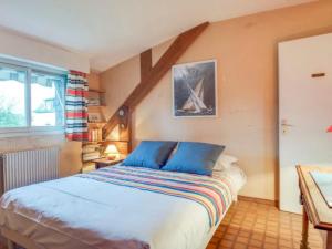 Giường trong phòng chung tại Holiday Home Ty Mam Goz by Interhome +15 ảnh