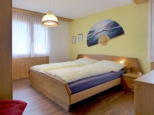 Postel nebo postele na pokoji v ubytování Apartment Allmi by Interhome