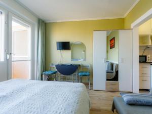 Televízia a/alebo spoločenská miestnosť v ubytovaní Studio Golden Gate by Interhome