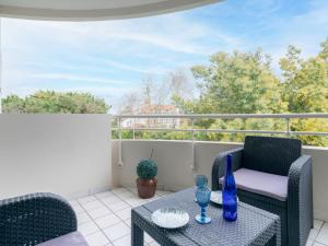 Balkón nebo terasa v ubytování Studio Les Terrasses du Golf by Interhome