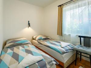 Posteľ alebo postele v izbe v ubytovaní Holiday Home Suzy by Interhome