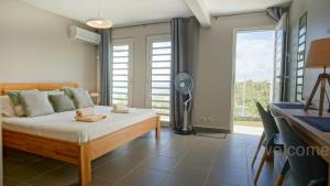 Una cama o camas en una habitación de Villa LABARQUE 2