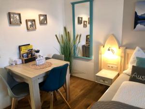 Postel nebo postele na pokoji v ubytování Apartment Goisernperle