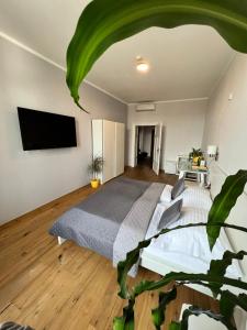 Posteľ alebo postele v izbe v ubytovaní Hotel Centrum