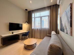 Zona d'estar a #Aura F24 apartments by halu!