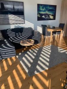 Televízia a/alebo spoločenská miestnosť v ubytovaní Lazy Deer - Apartamenty