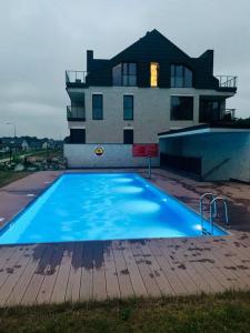 Bazén v ubytovaní Lazy Deer - Apartamenty alebo v jeho blízkosti