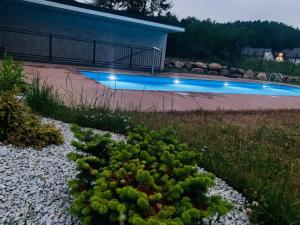 Bazén v ubytovaní Lazy Deer - Apartamenty alebo v jeho blízkosti