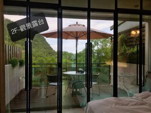 Balcone o terrazza di 礁溪好好沐包棟溫泉Villa 龜山島景觀 客餐廳可開伙 KTV Netflix 禁菸 戶外平面停車