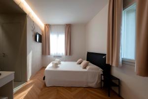 Posteľ alebo postele v izbe v ubytovaní Le Makè bed & breakfast