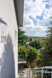 a view from the side of a building with a fence at Le Makè bed & breakfast in Campi Bisenzio
