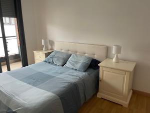 Postel nebo postele na pokoji v ubytování Relájate en Ramales de la Victoria, apartamento con piscina y parking