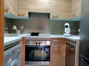 Kuchyň nebo kuchyňský kout v ubytování Relájate en Ramales de la Victoria, apartamento con piscina y parking