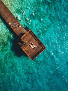 an overhead view of a boat in the water at Mia Bacalar Luxury Resort & Spa in Bacalar