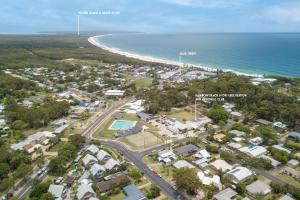 an aerial view of the beach and the ocean at Little Salty Vibes in Rainbow Beach