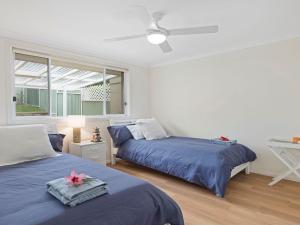 Giường trong phòng chung tại Ancora