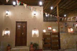 Fotografie z fotogalerie ubytování نزل مزارعة التراثية mazarah heritage inn v destinaci Nazvá