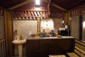 Kuchyň nebo kuchyňský kout v ubytování نزل مزارعة التراثية mazarah heritage inn