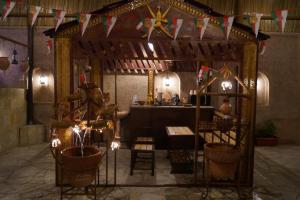 Restaurace v ubytování نزل مزارعة التراثية mazarah heritage inn