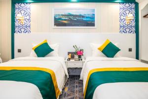 Voodi või voodid majutusasutuse Fu Hua Hotel toas