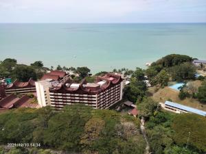 an aerial view of a hotel with the ocean in the background at Airbnb at Sri Sayang Batu Ferringhi Beach in Batu Ferringhi