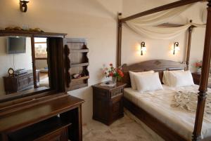 Katil atau katil-katil dalam bilik di An unspoilt setting, luxurious surroundings and a warm, personal welcome