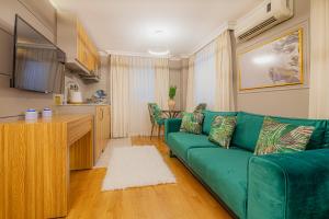 A television and/or entertainment centre at La Palace Exclusive Design