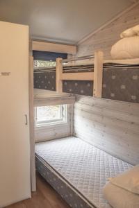 Postel nebo postele na pokoji v ubytování Hafsten Resort
