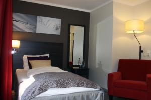 Postel nebo postele na pokoji v ubytování Sørmarka Konferansehotell