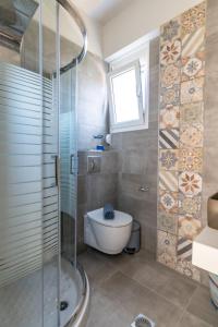 Ένα μπάνιο στο Kyma Seaview Apartment 2, Episkopi Beach