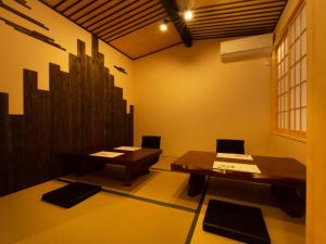 Posezení v ubytování Guest House Suzumeno Kakurembo