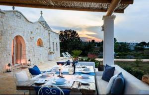 Posezení v ubytování Trulli Gianpaolo - Luxury Villa