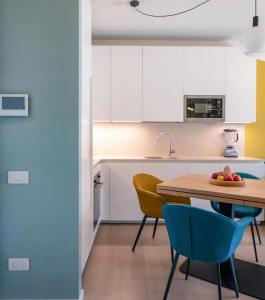 Η κουζίνα ή μικρή κουζίνα στο ComeCasa Design Apartment terrazzo e palestra