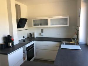 Kuchyň nebo kuchyňský kout v ubytování Exklusive Wohnung mit Brettachblick + 2 fotografie
