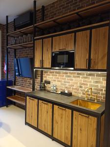 Kuchyň nebo kuchyňský kout v ubytování Sonya Apartments