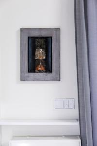 a picture of a fireplace in a room at K2 SUITE in Thessaloniki