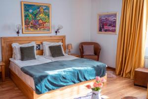 A bed or beds in a room at Rodope Nook Guest house