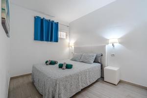 Posteľ alebo postele v izbe v ubytovaní APARTAMENTO DE LUJO EN MARE VERDE