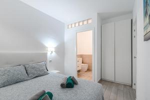 Posteľ alebo postele v izbe v ubytovaní APARTAMENTO DE LUJO EN MARE VERDE