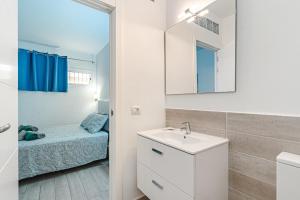 Posteľ alebo postele v izbe v ubytovaní APARTAMENTO DE LUJO EN MARE VERDE