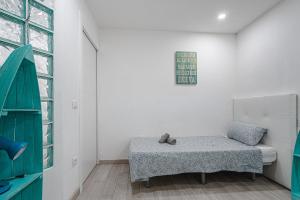Posteľ alebo postele v izbe v ubytovaní APARTAMENTO DE LUJO EN MARE VERDE