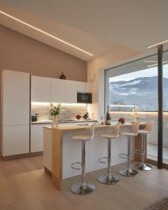 Una cocina o cocineta en Penthouse I CIPRESSI