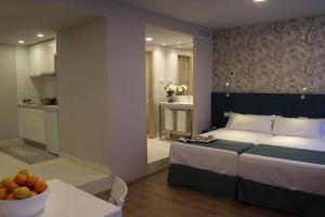 Postel nebo postele na pokoji v ubytování Modo Hotel Apartamento