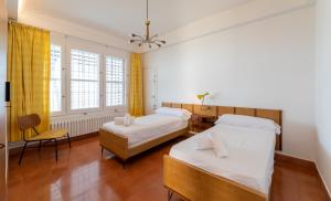 Postel nebo postele na pokoji v ubytování Villa Can Bagués