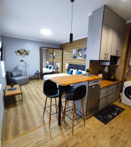 Køkken eller tekøkken på Apart Club Tolstogo